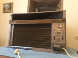 Wall-mounted split system air conditioner