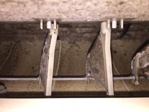 Dirty indoor hi-wall air conditioner unit