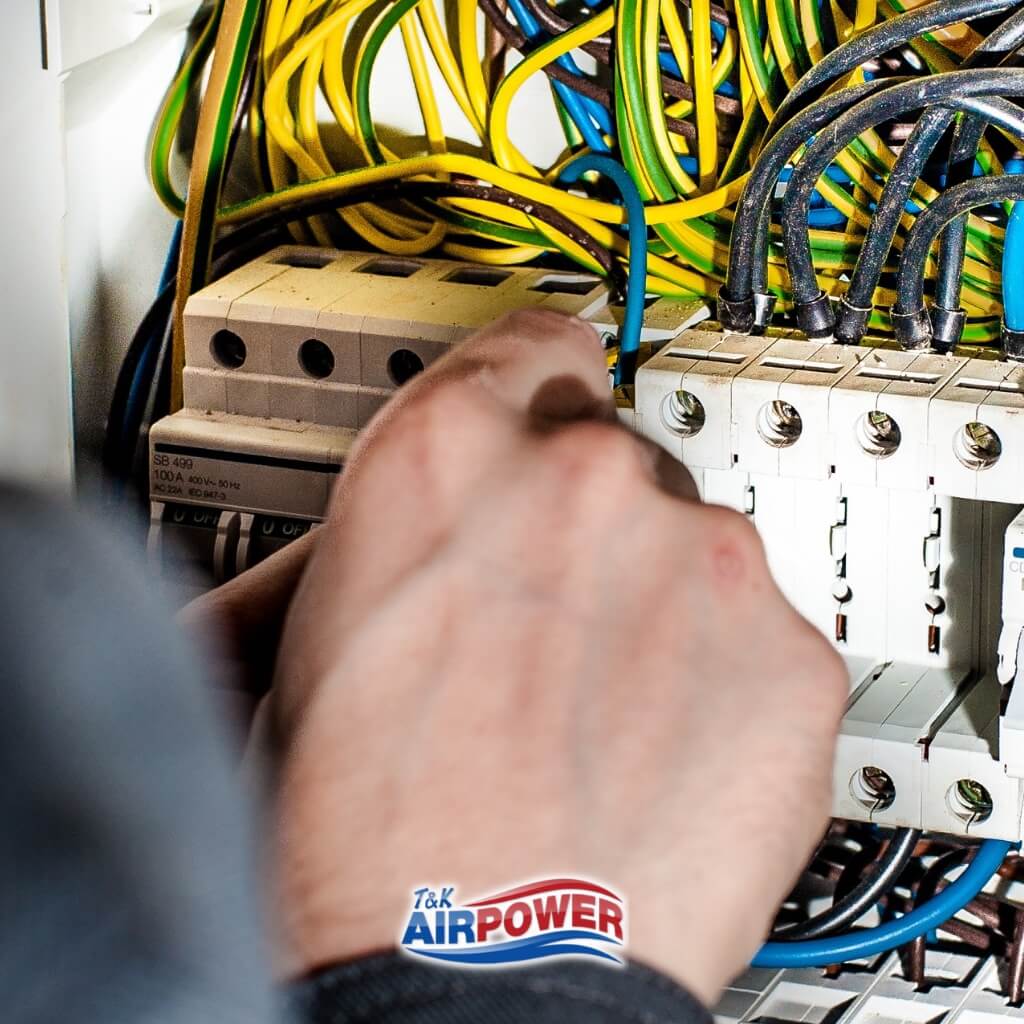 Domestic Electrical Services: Your Key to a Safer Home 12 Person working on electrical wiring.