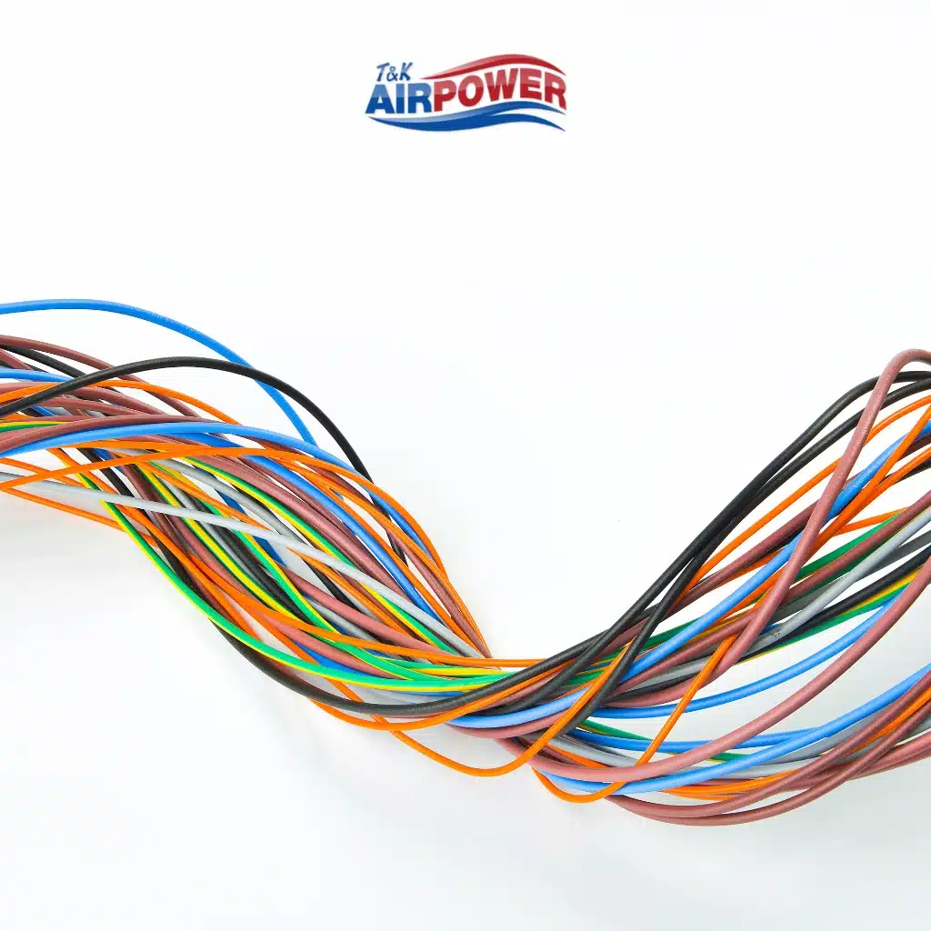 When to Repair vs. Replace Electrical Wiring in Your Home 9 Colorful electrical wires twisted together with the T&K AirPower logo above on a white background.