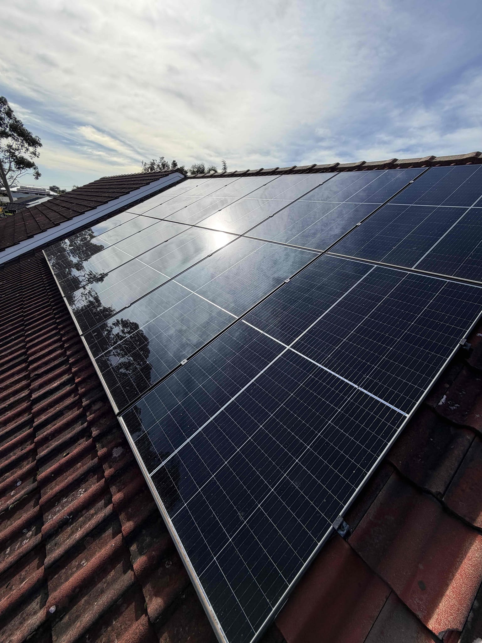 Solar System Repairs 7 solar panels installed on tiled roof